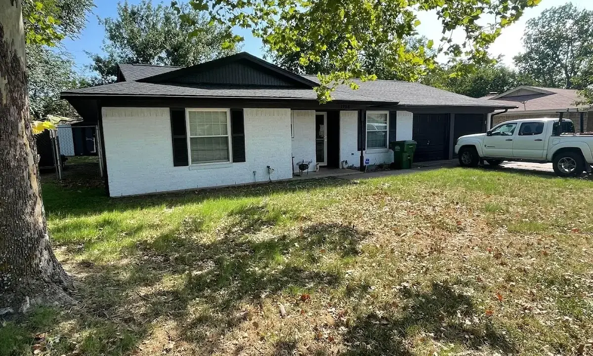 Professional roofing crew working on a residential roof in Indian Trail